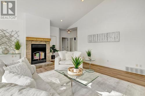 10541 Westshore Road, Vernon, BC - Indoor Photo Showing Living Room With Fireplace