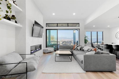 208 Skyland Drive, Kelowna, BC - Indoor Photo Showing Living Room With Fireplace