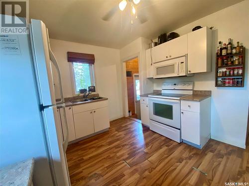 318 Centre Street, Kyle, SK - Indoor Photo Showing Kitchen With Double Sink