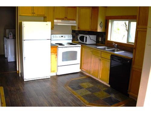 4953 Stevens Avenue, Canal Flats, BC - Indoor Photo Showing Kitchen With Double Sink