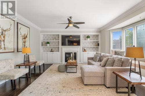 91 Eclipse Place, Oshawa, ON - Indoor Photo Showing Living Room With Fireplace