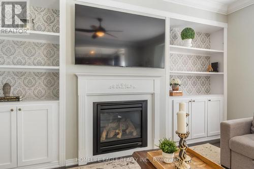 91 Eclipse Place, Oshawa, ON - Indoor Photo Showing Living Room With Fireplace