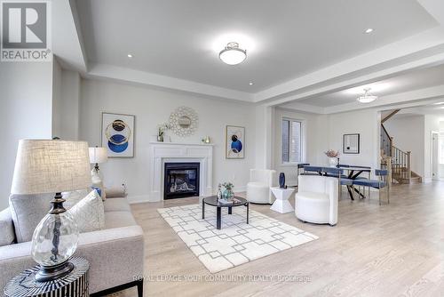 33 Kenneth Rogers Crescent, East Gwillimbury, ON - Indoor Photo Showing Living Room With Fireplace