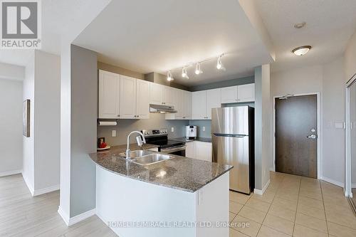 1710 - 9 George Street N, Brampton, ON - Indoor Photo Showing Kitchen With Stainless Steel Kitchen With Double Sink