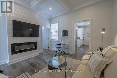 5 Florence Street, Hamilton, ON - Indoor Photo Showing Living Room With Fireplace