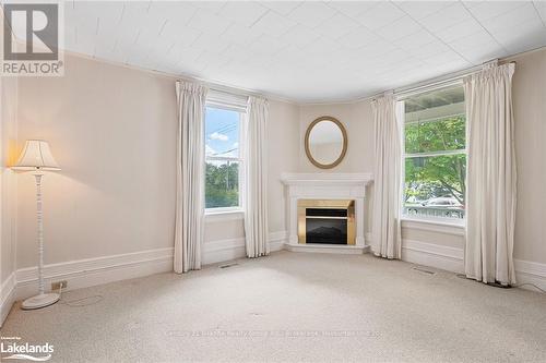 134 Highland Street, Dysart Et Al, ON - Indoor Photo Showing Living Room With Fireplace