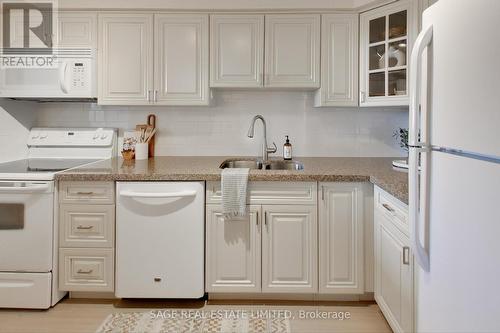 909 - 1110 Walden Circle, Mississauga, ON - Indoor Photo Showing Kitchen With Double Sink