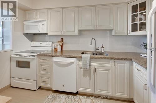 909 - 1110 Walden Circle, Mississauga, ON - Indoor Photo Showing Kitchen With Double Sink