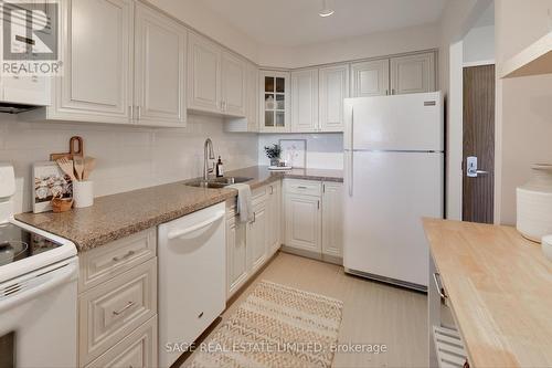 909 - 1110 Walden Circle, Mississauga, ON - Indoor Photo Showing Kitchen With Double Sink