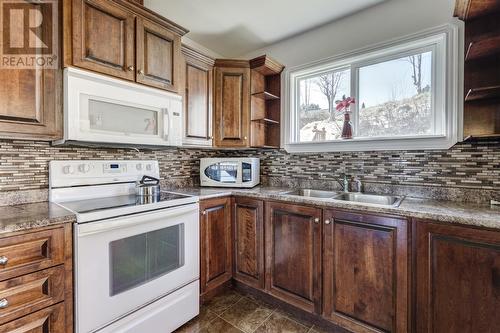 287 Main Road, Norman'S Cove-Long Cove, NL - Indoor Photo Showing Kitchen With Double Sink