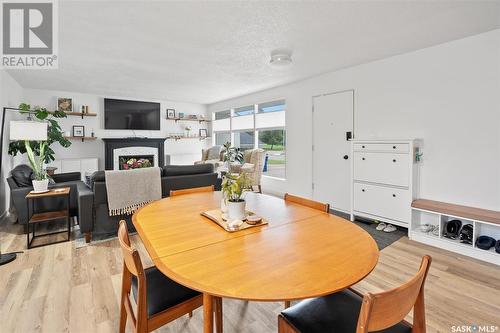 8 Sullivan Street, Saskatoon, SK - Indoor Photo Showing Dining Room With Fireplace