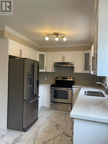 44 Linkdale Road, Brampton, ON - Indoor Photo Showing Kitchen With Double Sink