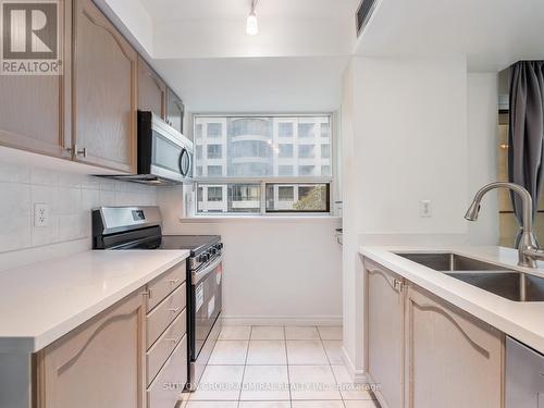 301 - 30 Hayden Street, Toronto, ON - Indoor Photo Showing Kitchen With Double Sink