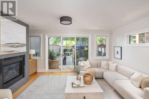 100 Blantyre Avenue, Toronto, ON - Indoor Photo Showing Living Room With Fireplace