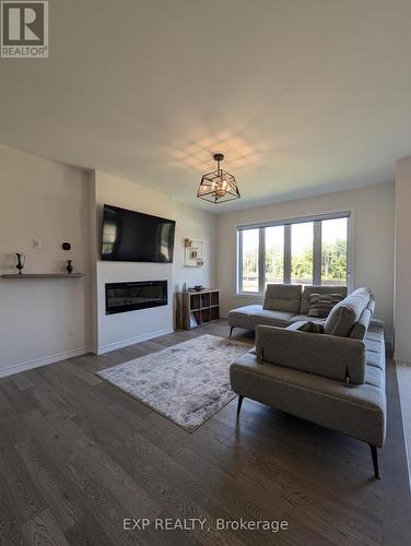 196 Ramblewood Drive, Wasaga Beach, ON - Indoor Photo Showing Living Room With Fireplace