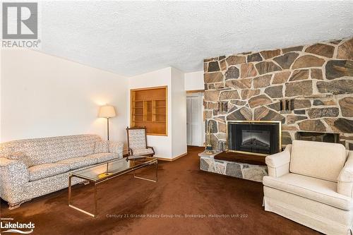 136 Highland Street, Dysart Et Al, ON - Indoor Photo Showing Living Room With Fireplace