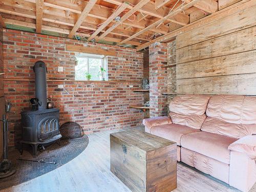 Family room - 529 3E Avenue Du Lac-Capri, Saint-Colomban, QC - Indoor With Fireplace