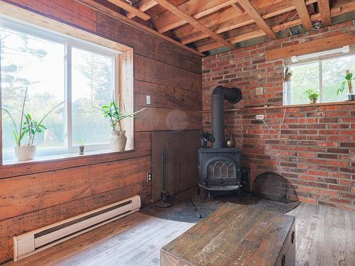 Family room - 529 3E Avenue Du Lac-Capri, Saint-Colomban, QC - Indoor Photo Showing Other Room With Fireplace