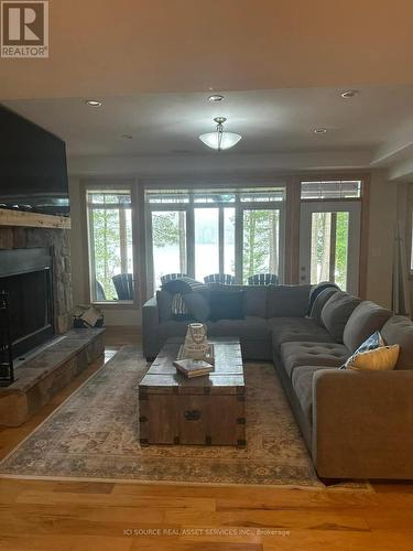 Lot B - 1102 Bebris Road, Central Frontenac, ON - Indoor Photo Showing Living Room With Fireplace