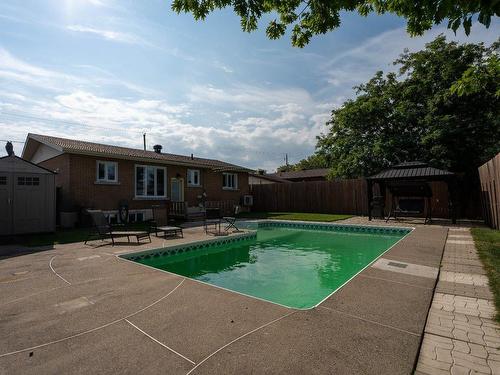 Back facade - 930 108E Avenue, Drummondville, QC - Outdoor With In Ground Pool