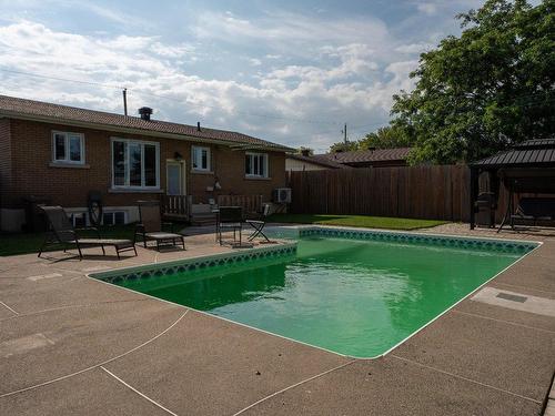 Back facade - 930 108E Avenue, Drummondville, QC - Outdoor With In Ground Pool