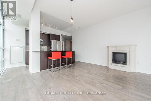 2005 - 65 East Liberty Street, Toronto, ON - Indoor Photo Showing Living Room With Fireplace