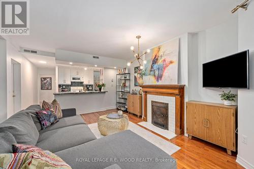 204 - 275 Queens Avenue, London, ON - Indoor Photo Showing Living Room With Fireplace