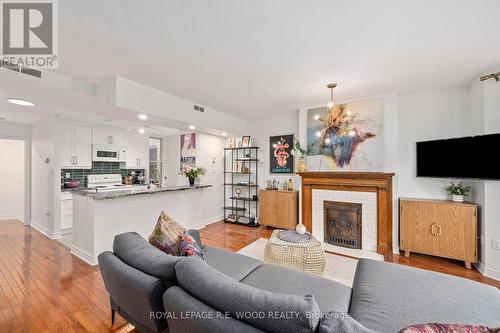 204 - 275 Queens Avenue, London, ON - Indoor Photo Showing Living Room With Fireplace