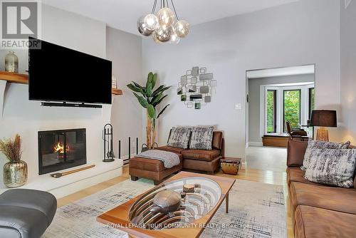 22 - 7745 Wellington Road, Guelph/Eramosa, ON - Indoor Photo Showing Living Room With Fireplace