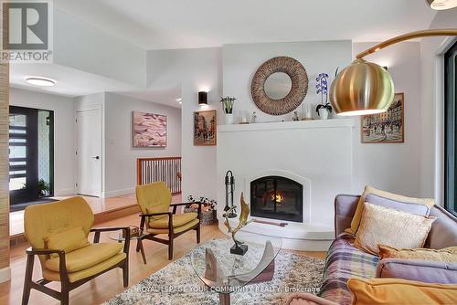 22 - 7745 Wellington Road, Guelph/Eramosa, ON - Indoor Photo Showing Living Room With Fireplace