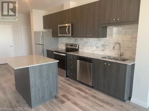 104 Garment Street Unit# 1602, Kitchener, ON - Indoor Photo Showing Kitchen With Double Sink With Upgraded Kitchen