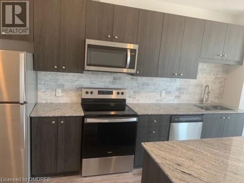 104 Garment Street Unit# 1602, Kitchener, ON - Indoor Photo Showing Kitchen With Double Sink With Upgraded Kitchen