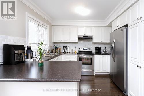 67 - 2178 Fiddlers Way, Oakville, ON - Indoor Photo Showing Kitchen With Stainless Steel Kitchen With Double Sink