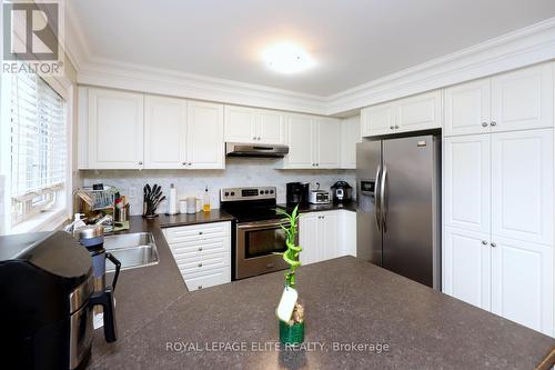 67 - 2178 Fiddlers Way, Oakville, ON - Indoor Photo Showing Kitchen With Stainless Steel Kitchen With Double Sink