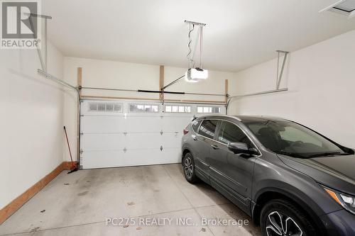 10 - 2022 Upperpoint Boulevard, London, ON - Indoor Photo Showing Garage