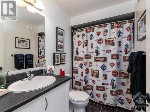 No need to go upstairs during a movie marathon! - 322 Tucana Way, Ottawa, ON - Indoor Photo Showing Bathroom