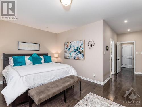 5 piece ensuite is just a few steps away from the bed.  No carpet on this level which was an upgrade. - 322 Tucana Way, Ottawa, ON - Indoor Photo Showing Bedroom