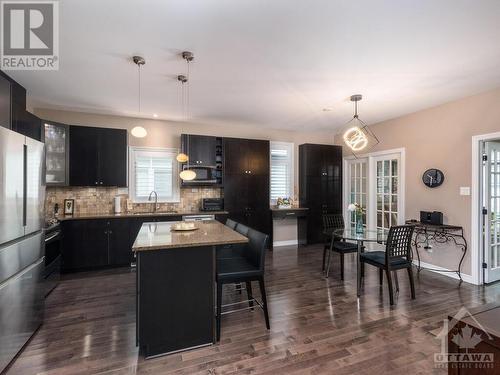 Kitchen is the heart of the home! Everyone wants to party in the kitchen. Put the appetizers out for a party or have an intimate dinner for two at the table. - 322 Tucana Way, Ottawa, ON - Indoor