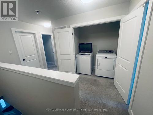 57 - 601 Lions Park Drive, Strathroy-Caradoc, ON - Indoor Photo Showing Laundry Room