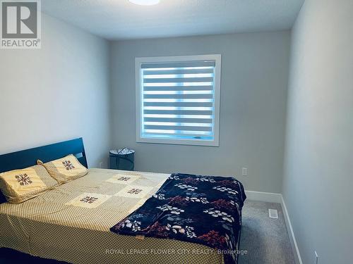 57 - 601 Lions Park Drive, Strathroy-Caradoc, ON - Indoor Photo Showing Bedroom