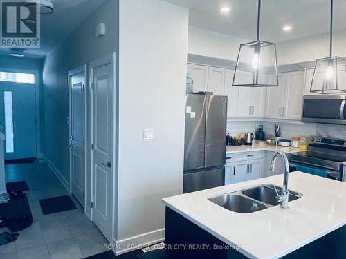 57 - 601 Lions Park Drive, Strathroy-Caradoc, ON - Indoor Photo Showing Kitchen With Double Sink