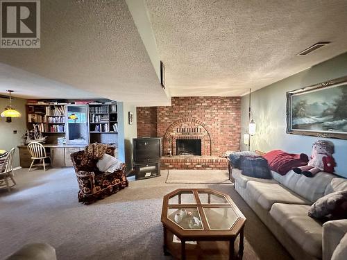 6099 Montgomery Crescent, Prince George, BC - Indoor Photo Showing Living Room With Fireplace