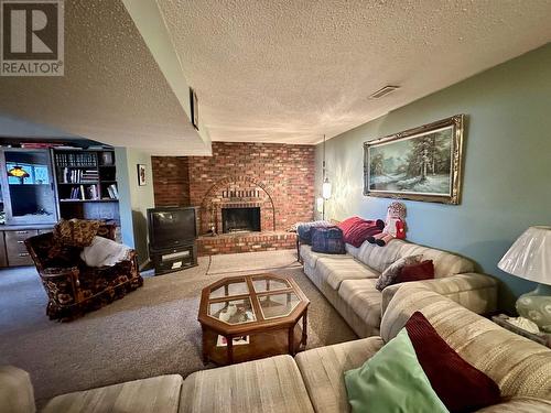 6099 Montgomery Crescent, Prince George, BC - Indoor Photo Showing Living Room With Fireplace