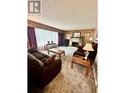 6099 Montgomery Crescent, Prince George, BC - Indoor Photo Showing Living Room With Fireplace