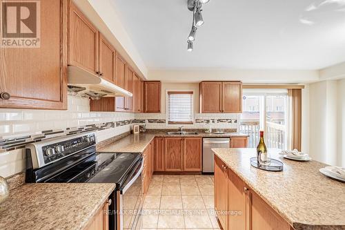 791 Candlestick Circle, Mississauga, ON - Indoor Photo Showing Kitchen With Double Sink