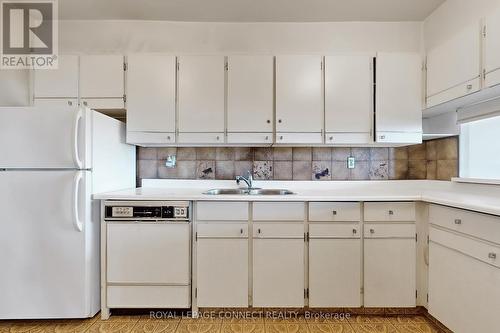 1908 - 2365 Kennedy Road, Toronto, ON - Indoor Photo Showing Kitchen With Double Sink