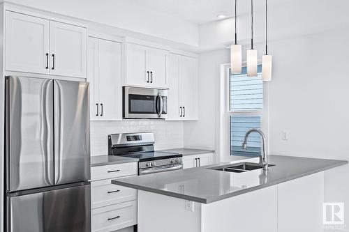 #29 2117 81 St Sw, Calgary, AB - Indoor Photo Showing Kitchen With Double Sink With Upgraded Kitchen