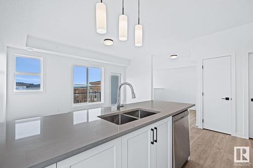 #29 2117 81 St Sw, Calgary, AB - Indoor Photo Showing Kitchen With Double Sink