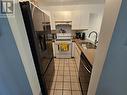 B 5117 Medeek Avenue, Terrace, BC  - Indoor Photo Showing Kitchen With Double Sink 