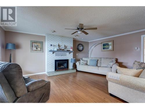 450 Hollywood Road S, Kelowna, BC - Indoor Photo Showing Living Room With Fireplace